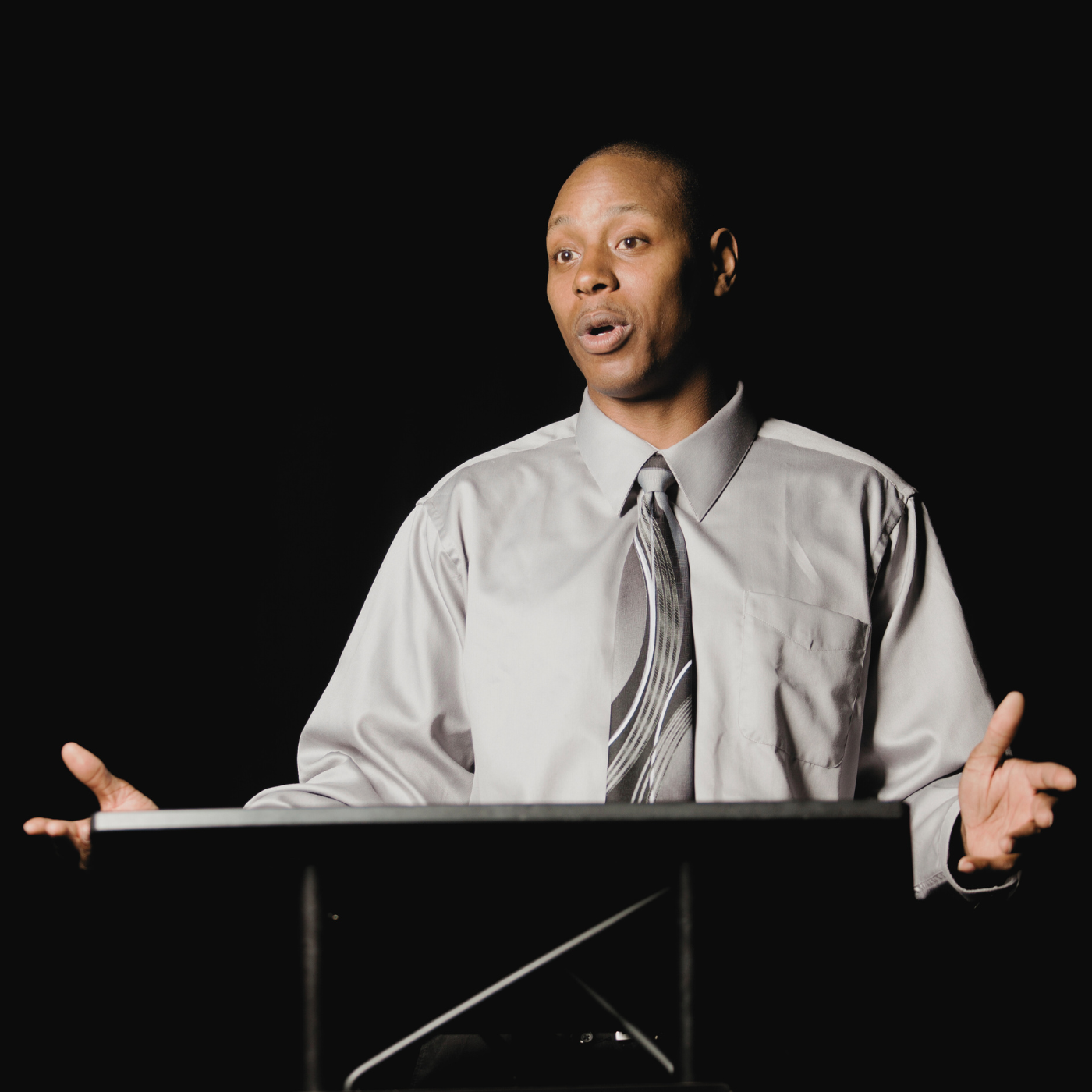 Businessman Talking with Audience